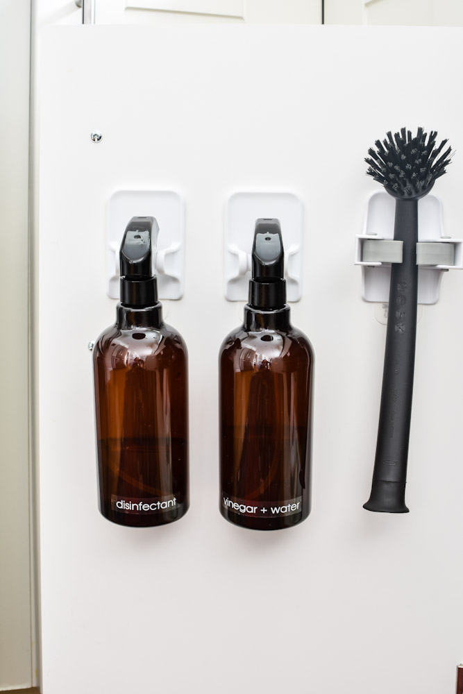 Command spray hooks under the sink cabinet