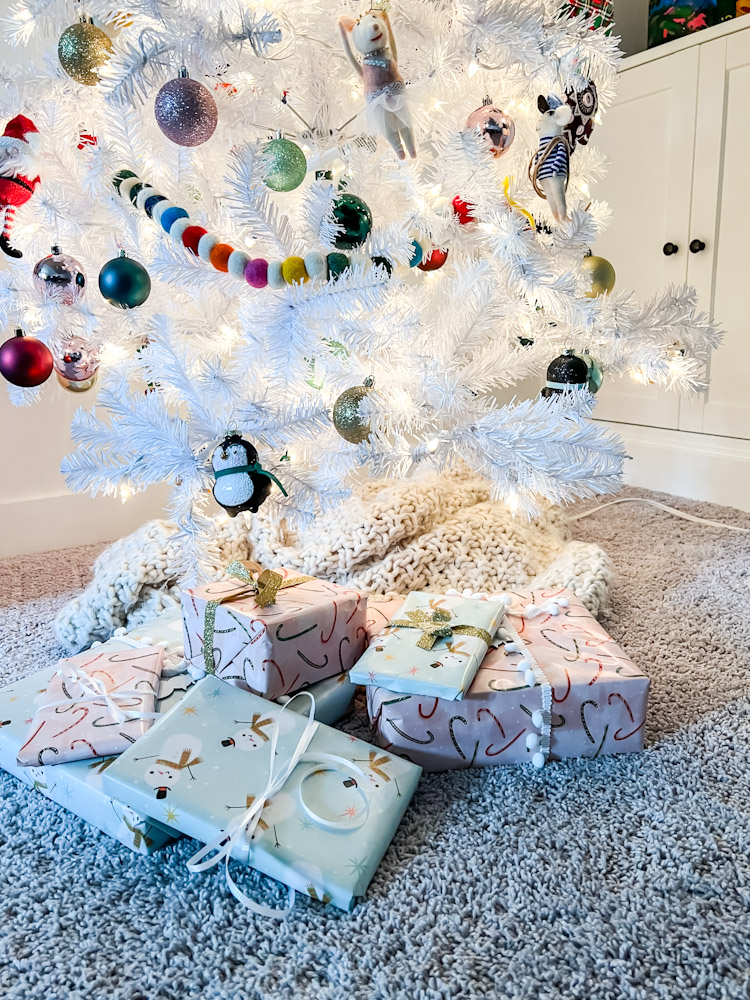 white kids tree with presents