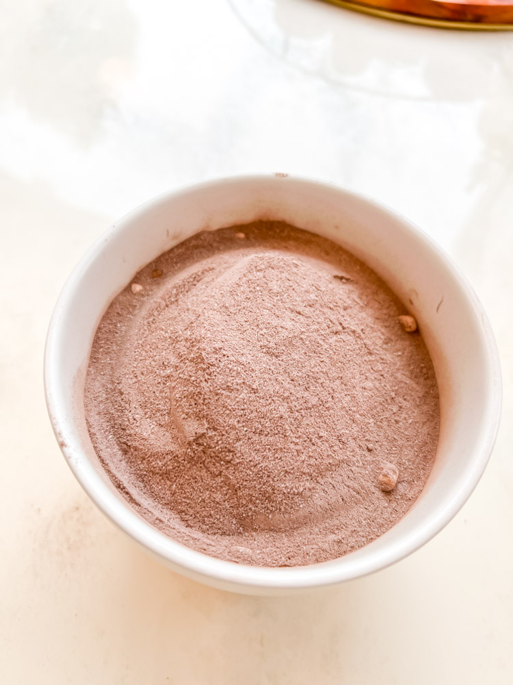 Hot chocolate powder in a canister