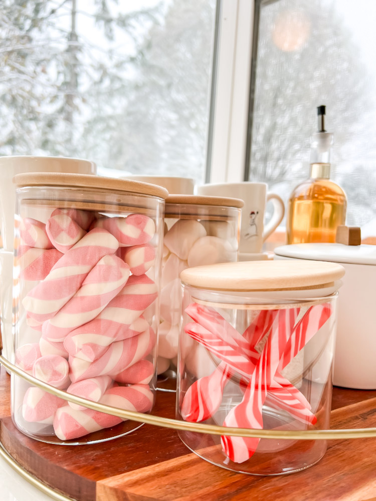 Marshmallows and candy cane stir spooons