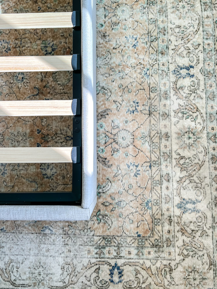 vintage turkish rug with bed frame
