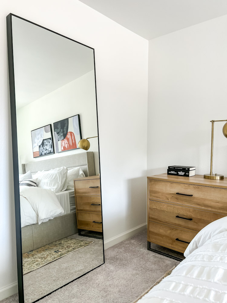 extra large mirror in a bedroom