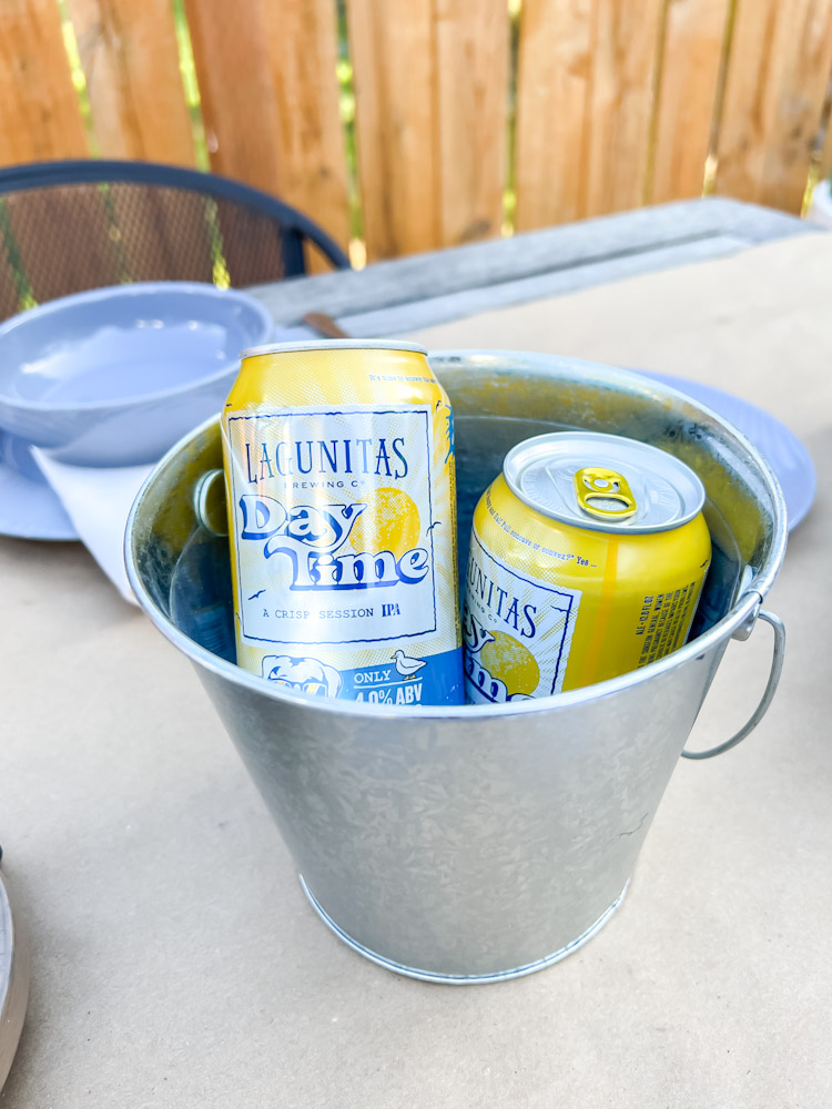 beer cans in aluminum bucket