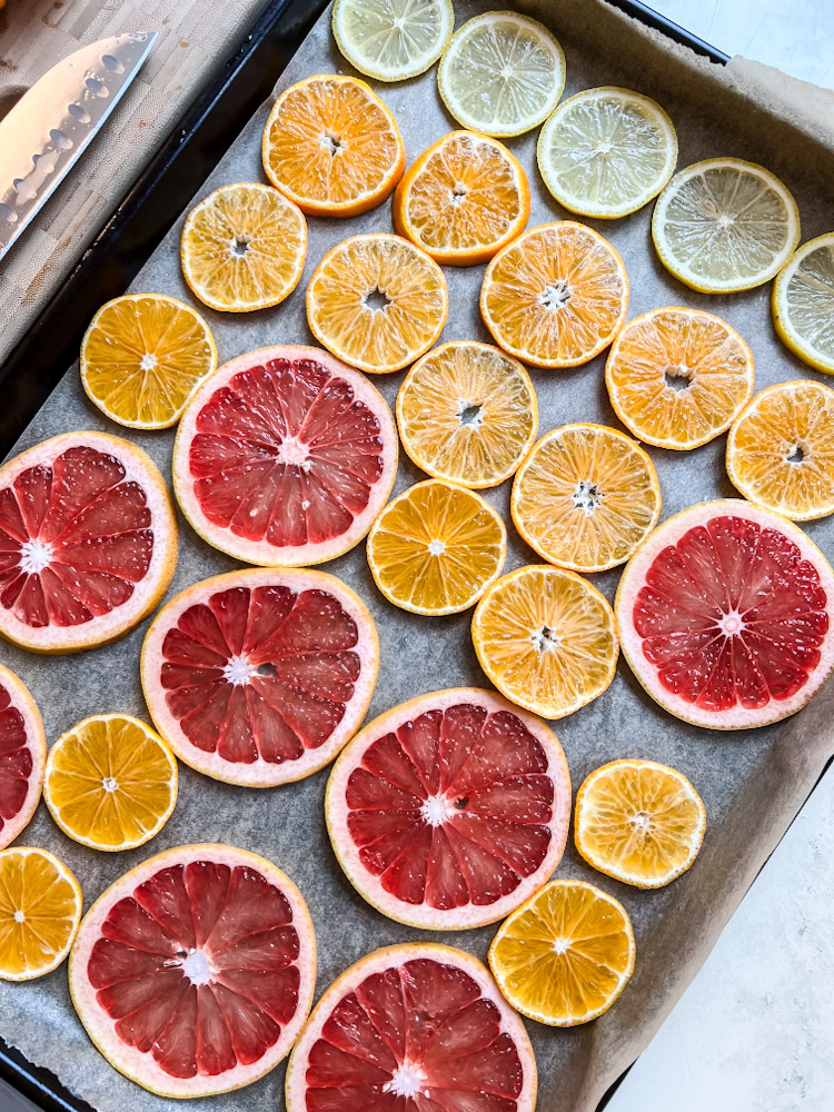sliced citrus on baking sheet